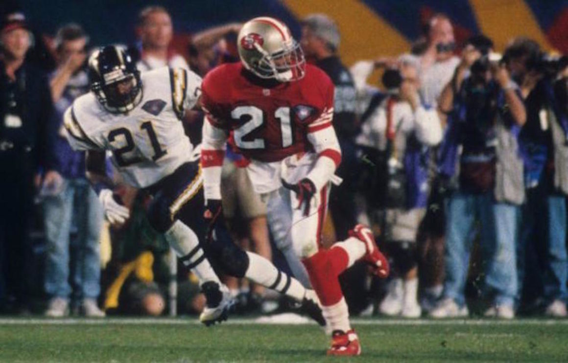 MIAMI, FL - JANUARY 29: Cornerback Deion Sanders #21 of the San Francisco 49ers runs a pass pattern as a wide reciver against the San Diego Chargers in Super Bowl XXIX at Joe Robbie Stadium on January 29, 1995 in Miami, Florida. The 49ers defeated the Chargers 49-26. (Photo by Joseph Patronite /Getty Images)