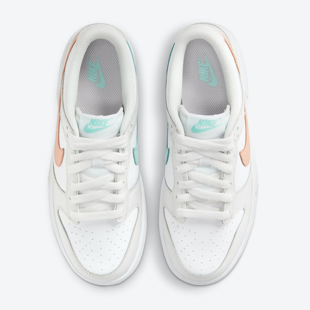 mismatched swoosh dunks